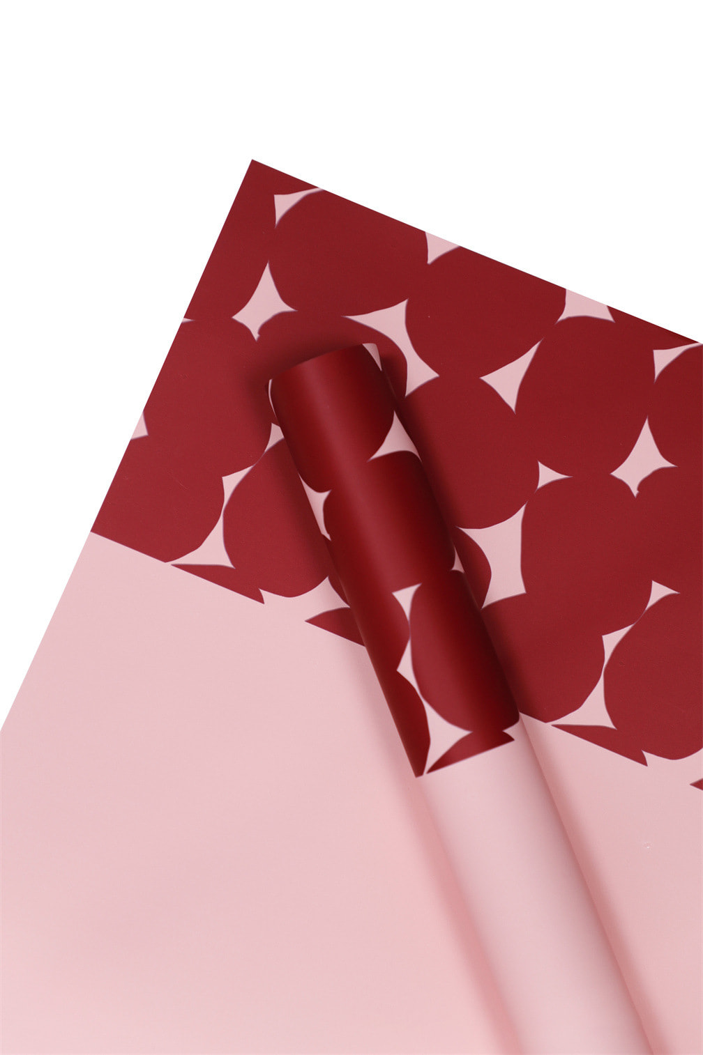 Zweifarbiges Geschenkpapier mit gepunkteten Blumen