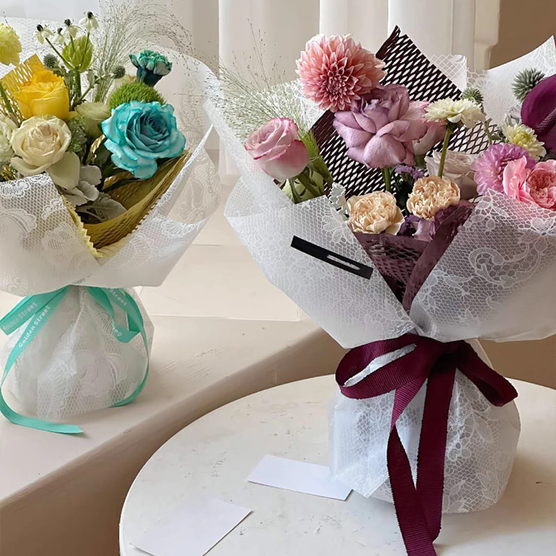 Nuosha-Blumen-Geschenkpapier in verschiedenen Mustern und Stilen