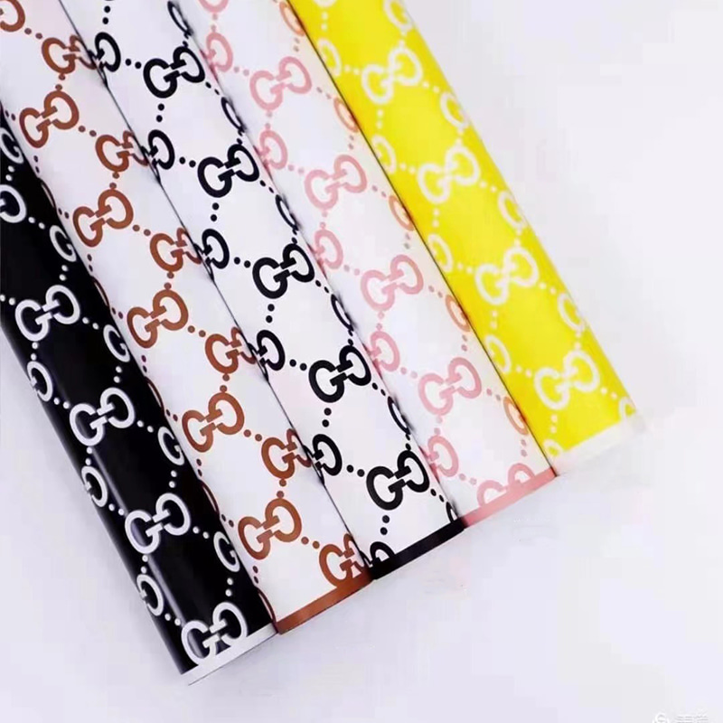 Modisches G-Flower-Geschenkpapier