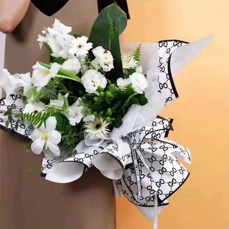Modisches G-Flower-Geschenkpapier